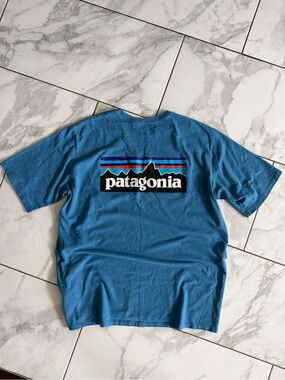 Patagonia Spell Out Logo Graphic Double Sided Fair Trade Blue Shirt Large